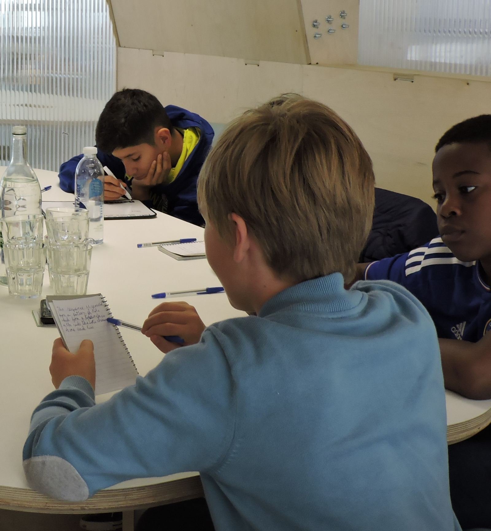 Students working in a More Curricular learning workshop