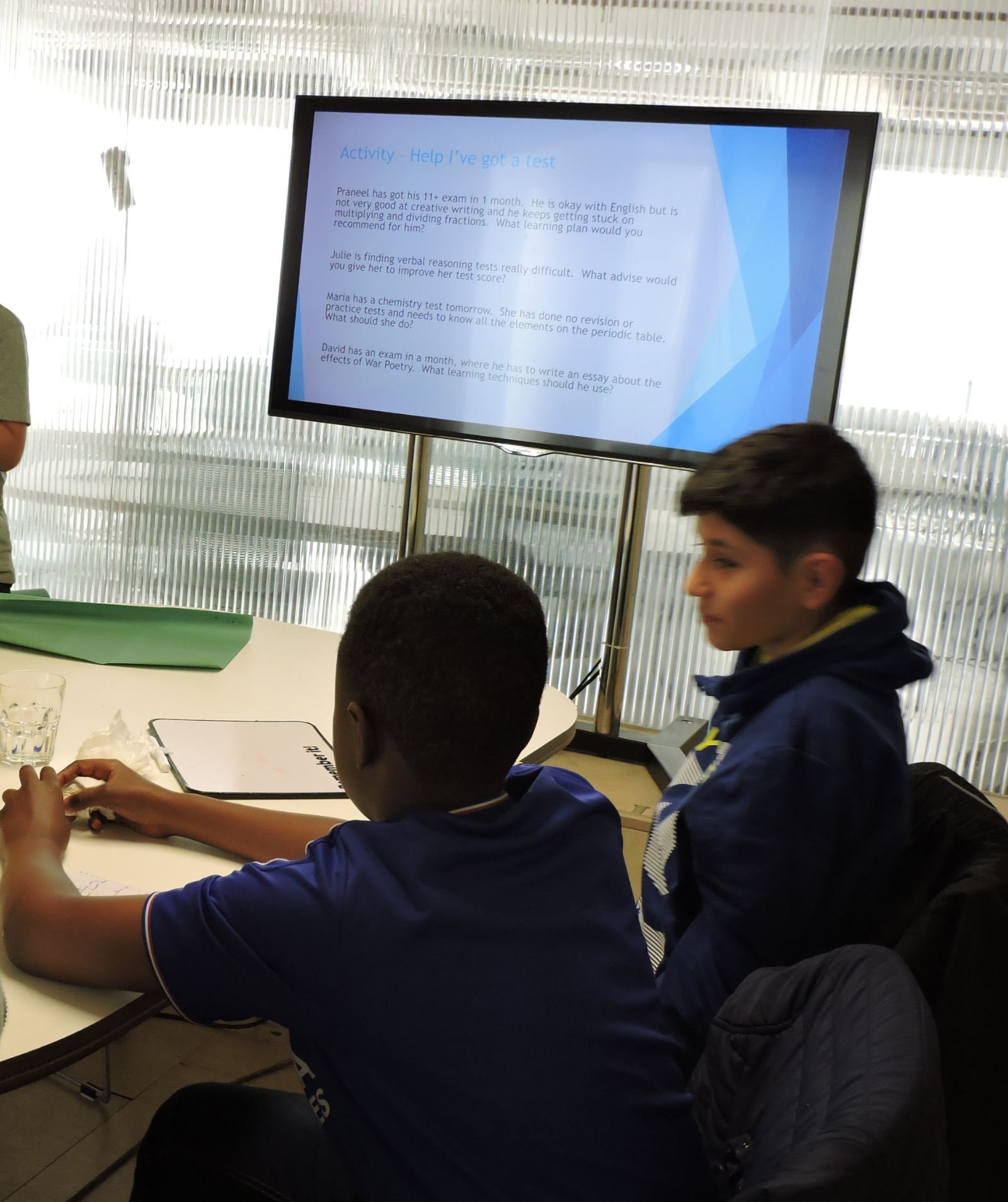 Students following a presentation in a study skills workshop